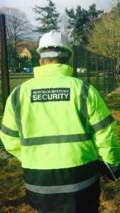 Security Guard Patrolling Vacant Property 